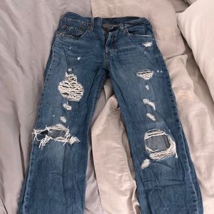 LEVI 501s size 27 medium distressed